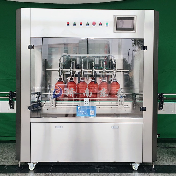 全自動(dòng)油類(lèi)灌裝機(jī).jpg 全自動(dòng)油類(lèi)灌裝機(jī).jpg